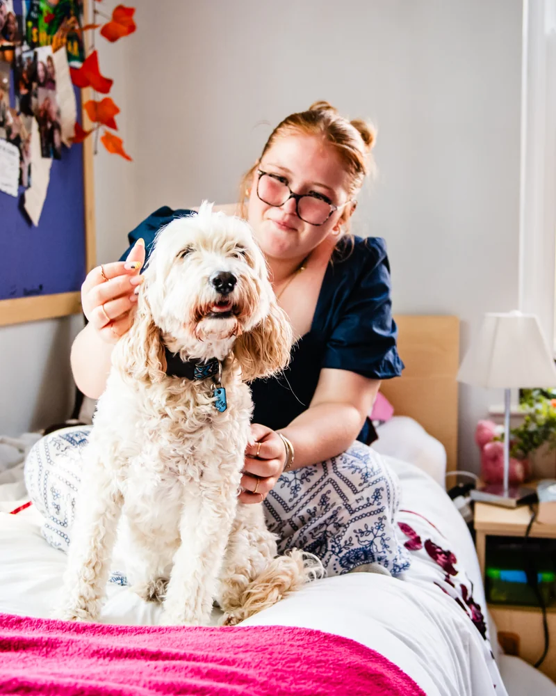 Adams House Boarding student with boarding house dog, Oscar